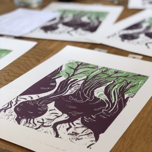 2 colour lino print of beetroot in burgundy and green